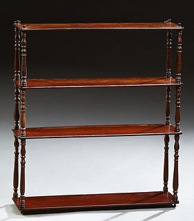 Empire Style Carved Mahogany Three Tier Wall Shelf, early 20th c., the rectangular top above three tiers joined by turned and tapere...
