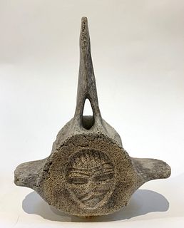 Carved Whalebone Vertebra with Face
