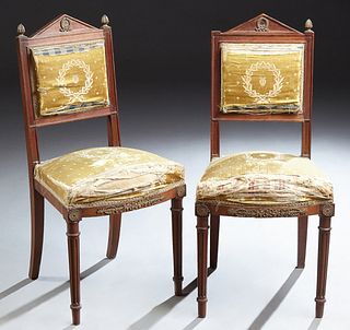 Pair of French Ormolu Mounted Louis XVI Style Carved Mahogany Upholstered Bedroom Chairs, 19th c., with cushioned back and bowed sea...