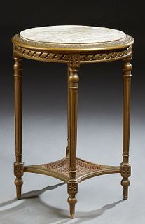 French Empire Style Beech Louis XVI Style Marble Top Pedestal Table, 19th c., the highly figured inset circular marble over a twist...