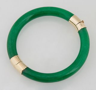 14K Yellow Gold and Jade Hinged Bangle Bracelet, with a safety chain, Int. Dia.- 2 1/4 in.