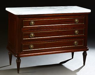 French Louis XVI Style Ormolu Mounted Carved Mahogany Marble Top Commode, 20th c., the highly figured stepped edge rounded corner wh...