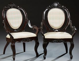 Pair of Large Louis XV Style Ebonized Fauteuils, 20th c., the canted arched upholstered medallion back with a shell crest, to double...