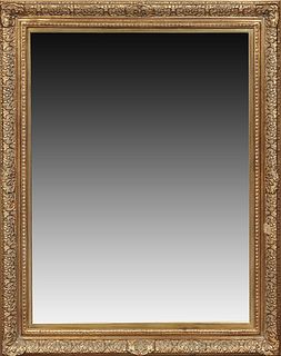 Large Gilt and Gesso Aesthetic Overmantel Mirror, 20th c., with a rounded relief C-scroll and floral frame, around a wide beveled pl...