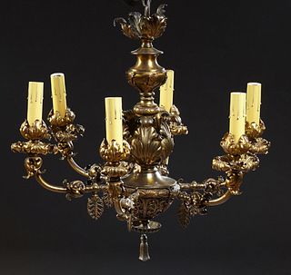 Louis XV Style Brass Plated Six Light Chandelier, 20th c., with a relief leaf mounted support to a lower relief half dome, issuing s...