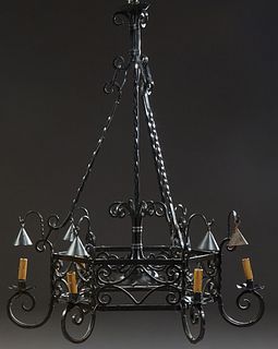 French Medieval Style Wrought Iron Six Light Chandelier, 20th c., with a scrolled support issuing three twisted supports to a hexago...