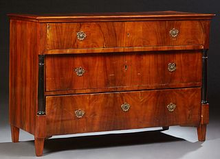 Biedermeier Style Walnut Commode, 19th c., the rectangular top over a frieze drawer above two setback drawers flanked by ebonized co...