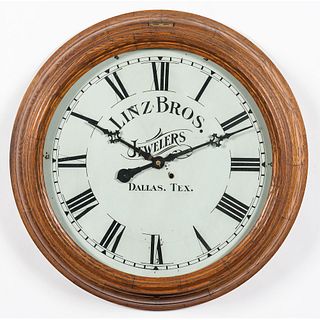 A New Haven Clock Co. Oak Gallery Clock