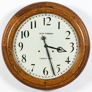 A Seth Thomas Oak Thirty Day Gallery Clock