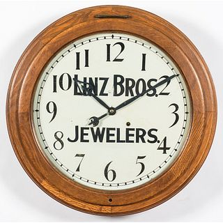 A Seth Thomas Oak Gallery Clock for Linz Bros. Jewelers
