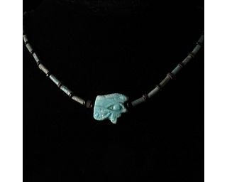 EGYPTIAN FAIENCE NECKLACE WITH EYE OF HORUS AMULET