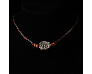 EGYPTIAN FAIENCE NECKLACE WITH SCARAB AMULET