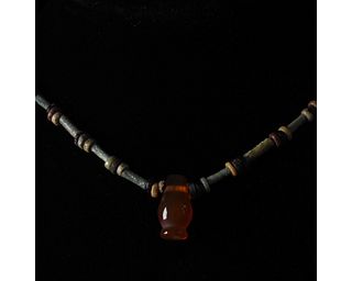 EGYPTIAN FAIENCE NECKLACE WITH CARNELIAN AMULET