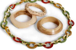 Lot comprising three bangles and a necklace