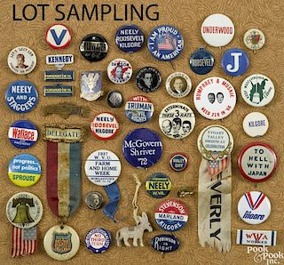 Large group of political pins and buttons.
