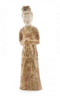 A Pottery Figure of a Court Lady Height 12 inches.