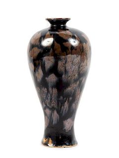 * A Jizhou Style Black Glazed Russet Splashed Stoneware Vase Height 9 inches.