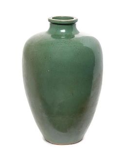 A Celadon Glazed Stoneware Vase Height 11 1/4 inches.
