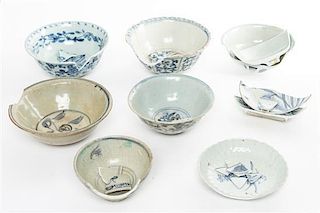 * A Group of Eight Blue and White Porcelain Bowls Diameter of largest 6 1/2 inches.