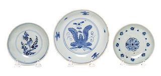 * A Group of Three Blue and White Porcelain Dishes Diameter of largest 5 1/4 inches.