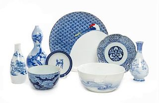 * A Group of Eight Blue and White Porcelain Table Articles Diameter of plate 10 3/8 inches.