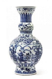 * A Blue and White Porcelain Vase Height 24 1/4 inches.