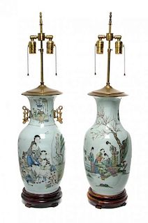 * A Pair of Famille Rose Porcelain Vases Height of porcelain 17 inches.