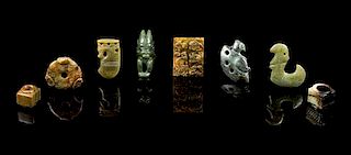 * A Group of Eight Jade Carvings Length of longest 2 3/4 inches.