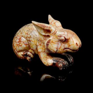 * A Jade Carving of a Rabbit Width 6 1/2 inches.