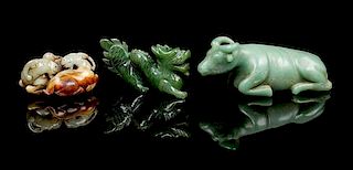 * A Group of Three Jade Carvings Length of longest 6 1/4 inches.