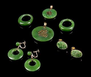 A Group of Chinese Spinach Jade Articles Diameter of largest 1 3/8 inches.