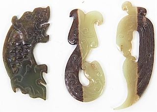 * A Group of Three Carved Jade and Hardstone Articles Length of longest 3 1/4 inches.