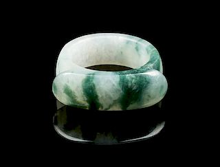 * A Small Jadeite Archer's Ring Diameter overall 1 inch.
