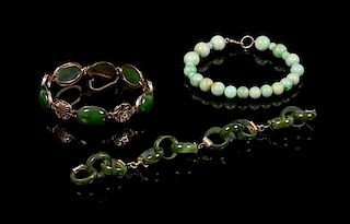 A Group of Three Hardstone Bracelets Length of longest 6 inches.