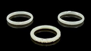 * A Group of Three Plastic Imitating Jade Bangles Diameter of interior of first 2 1/4 inches.