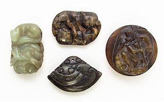 * A Group of Four Hardstone Carvings Diameter of buckle 2 1/8 inches.