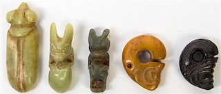 * A Group of Five Carved Hardstone Toggles Height of tallest 3 1/2 inches.