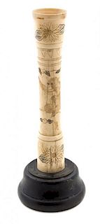 A Carved Bone Ornament Height overall 9 inches.
