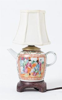 A Rose Medallion Porcelain Teapot Height 8 3/8 inches.