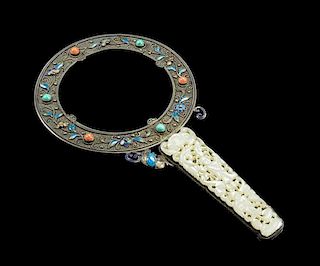 A Silver Filigree Magnifying Glass Height 7 1/2 inches.