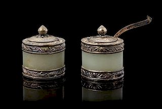 * A Pair of Silver and Jade Inset Salt and Pepper Height 1 1/4 inches.