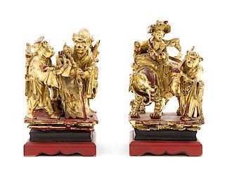 Two Gilt and Red Lacquered Wood Figural Groups Height of taller 7 inches.
