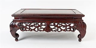 A Carved Rosewood Stand Height 7 1/4 x width 18 x depth 11 inches.