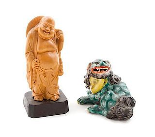 * A Carved Wood Figure of Budai Height of largest 4 x length 6 inches.