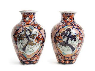 A Pair of Japanese Imari Porcelain Vases Height 12 1/4 inches.