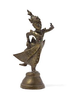 A Bronze Figure of a Deity Height 8 inches.