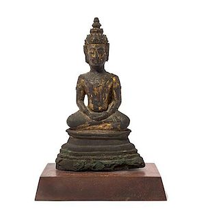 A Gilt Bronze Figure of Buddha Height 9 3/4 inches.