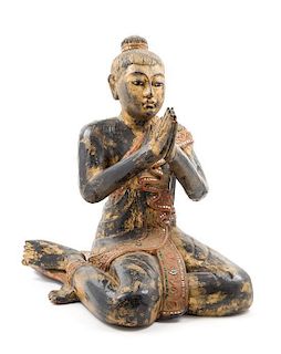 * A Burmese Lacquered Figure of a Seated Monk Height 20 inches.