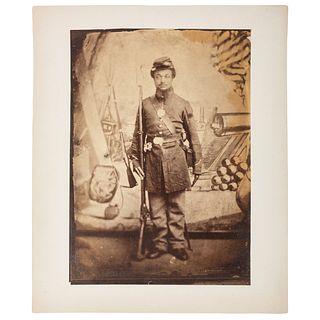 Albumen Photograph Featuring African American Soldier with Benton Barracks Backdrop