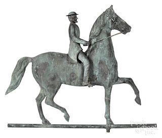 Swell bodied copper horse and rider weathervane